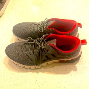 Mens size 11.5 ASICS tennis shoes.